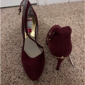 Burgundy suede material, Michael Kors heels. Size 9.